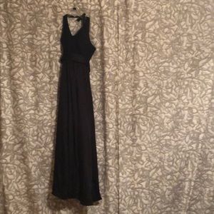 Black halter evening gown with pockets